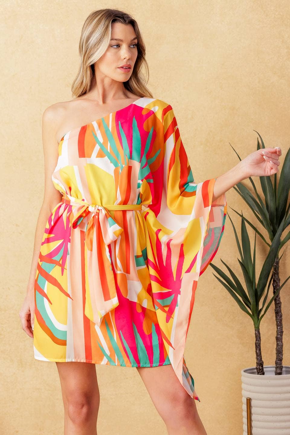 A printed woven kaftan mini dress