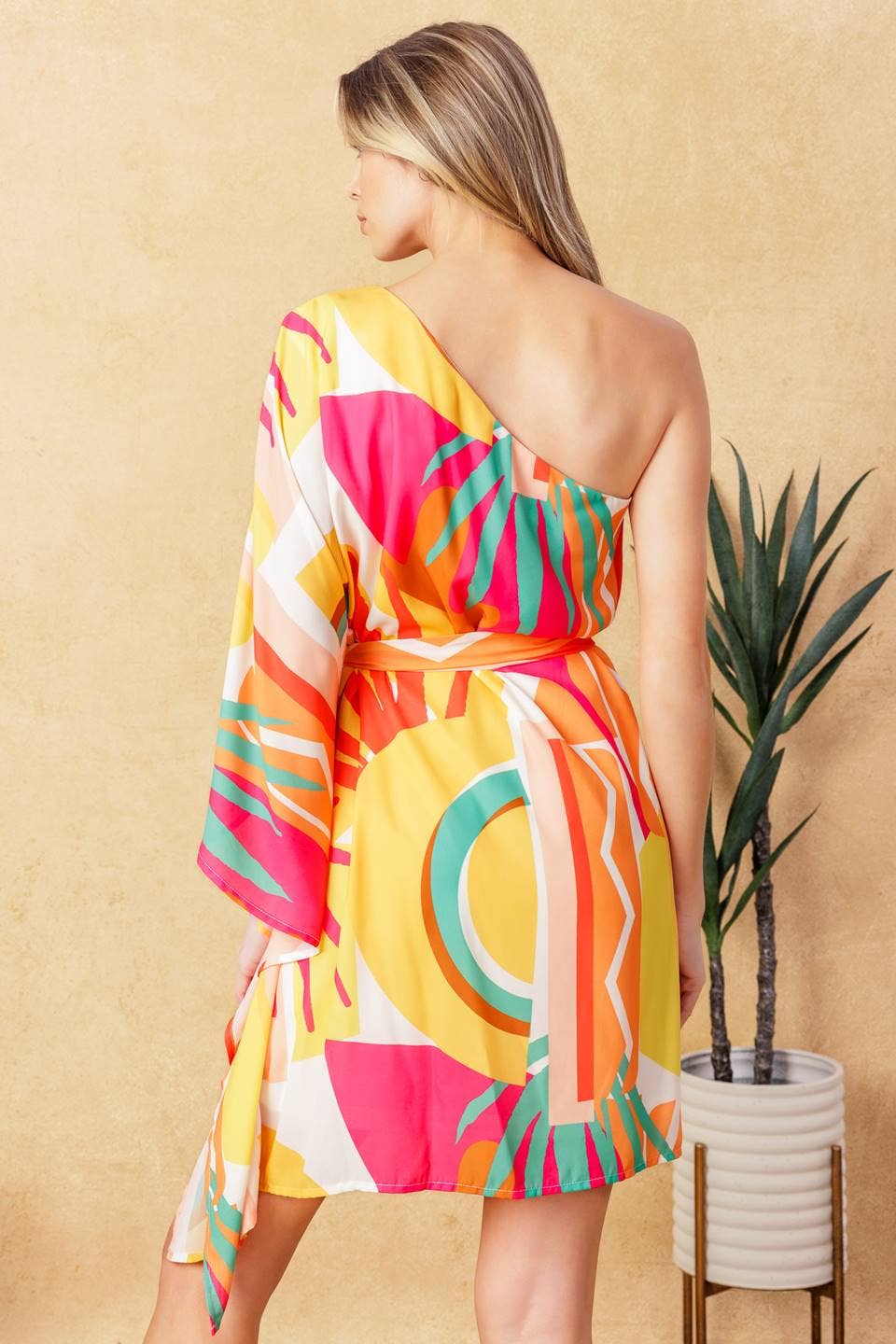 A printed woven kaftan mini dress